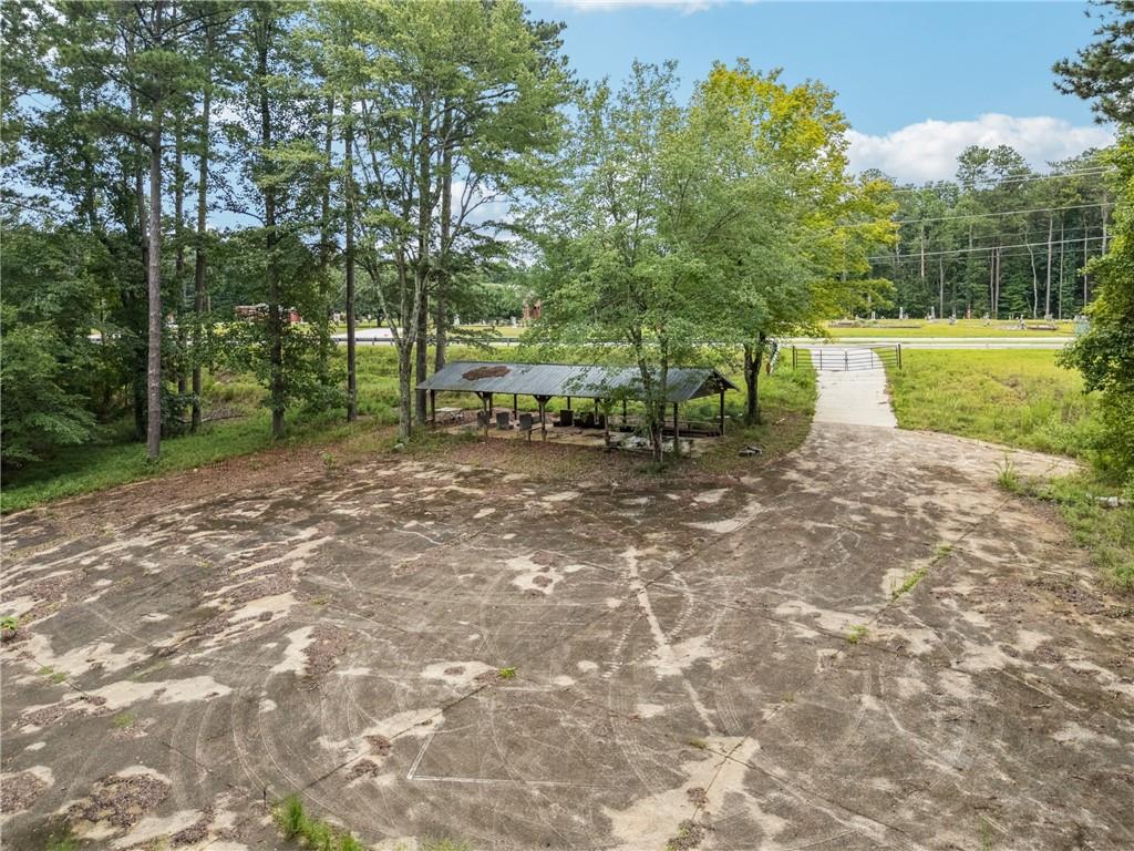 4527 Cumming Highway Canton, GA 30115 - Photo 7 of 8 a view of a park with large trees