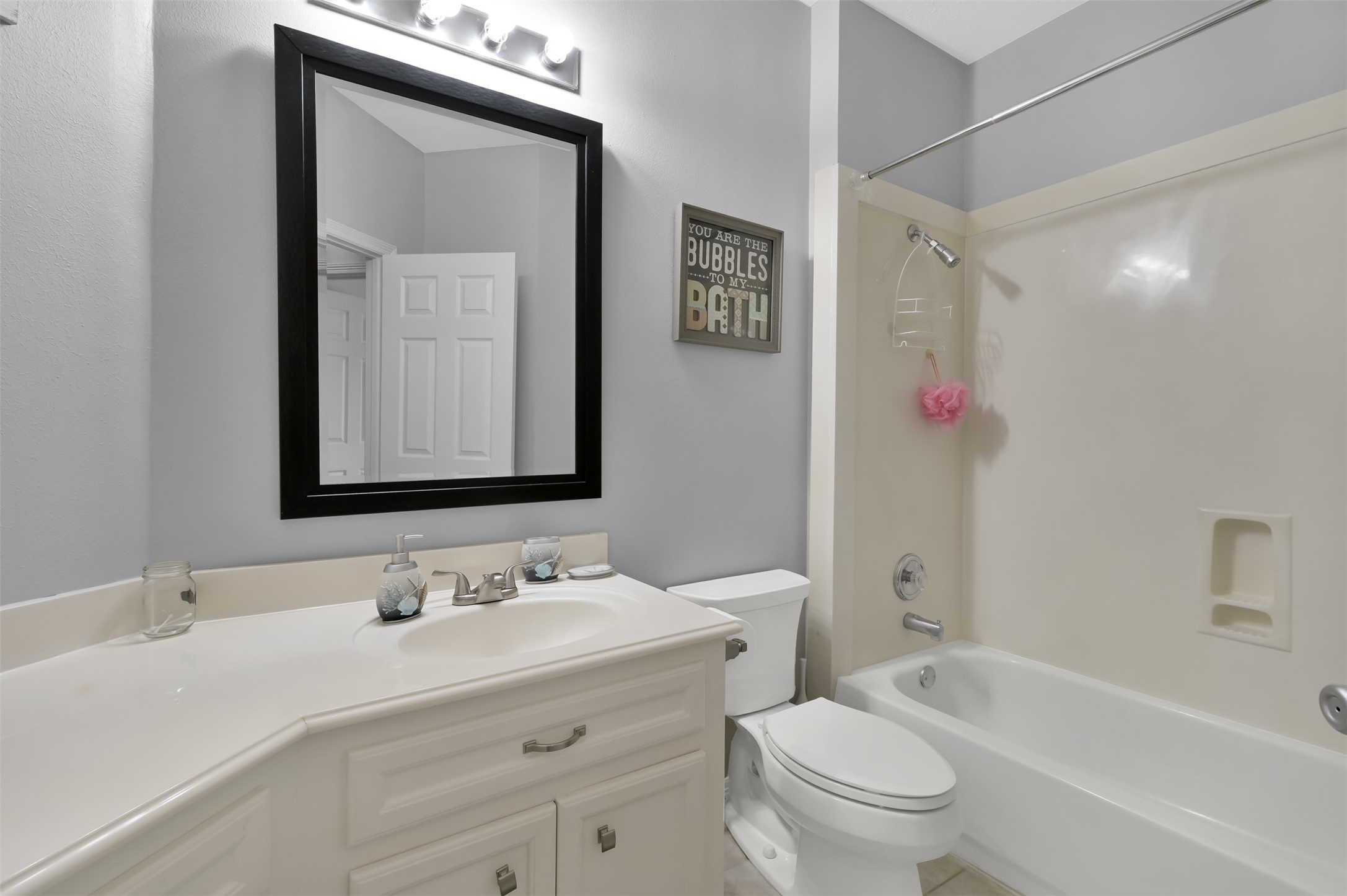 9706 Chipstead Court Spring, TX 77379 - Photo 37 of 44 Your third and final full bathroom is conveniently located near secondary bedroom number 3.