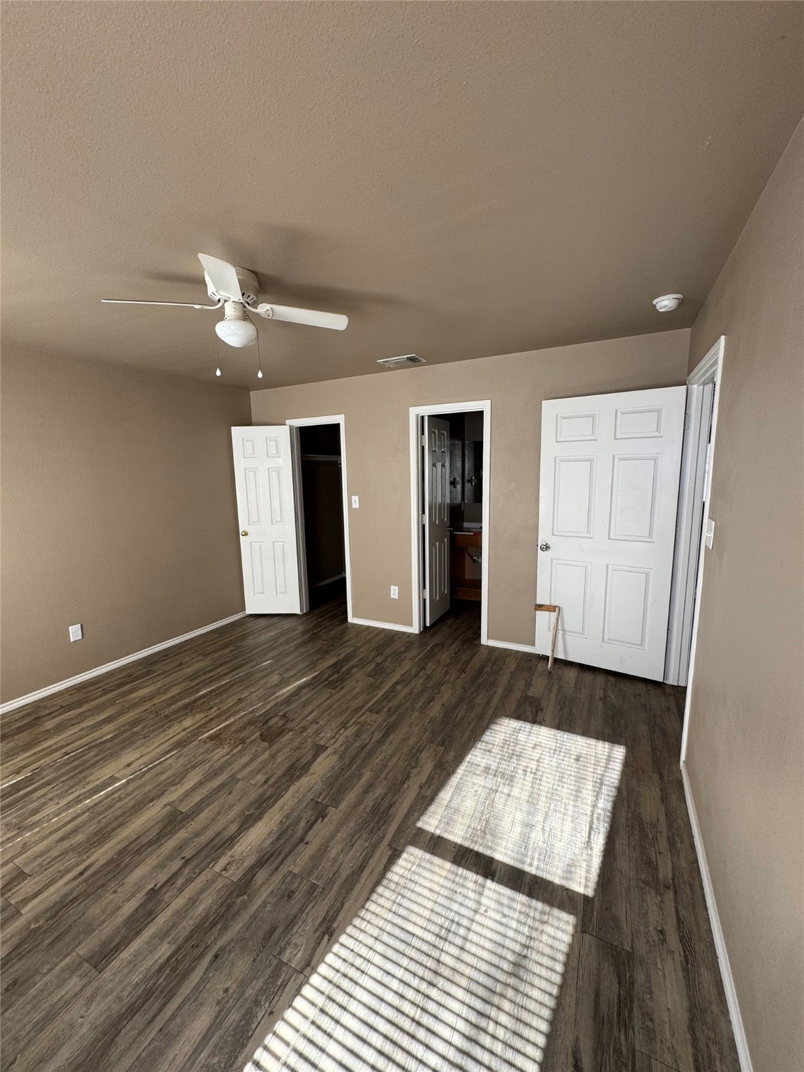 507 49th Street Lubbock, TX 79404 - Photo 12 of 50 a view of a room with wooden floor and closet