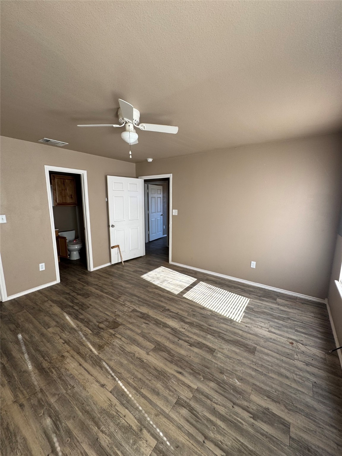 507 49th Street Lubbock, TX 79404 - Photo 13 of 50 a view of an empty room and chandelier fan