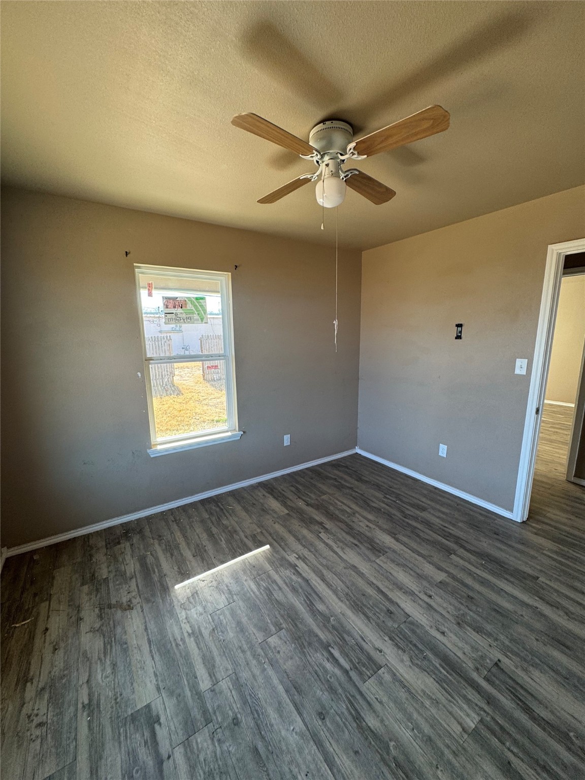 507 49th Street Lubbock, TX 79404 - Photo 18 of 50 an empty room with wooden floor closet and windows