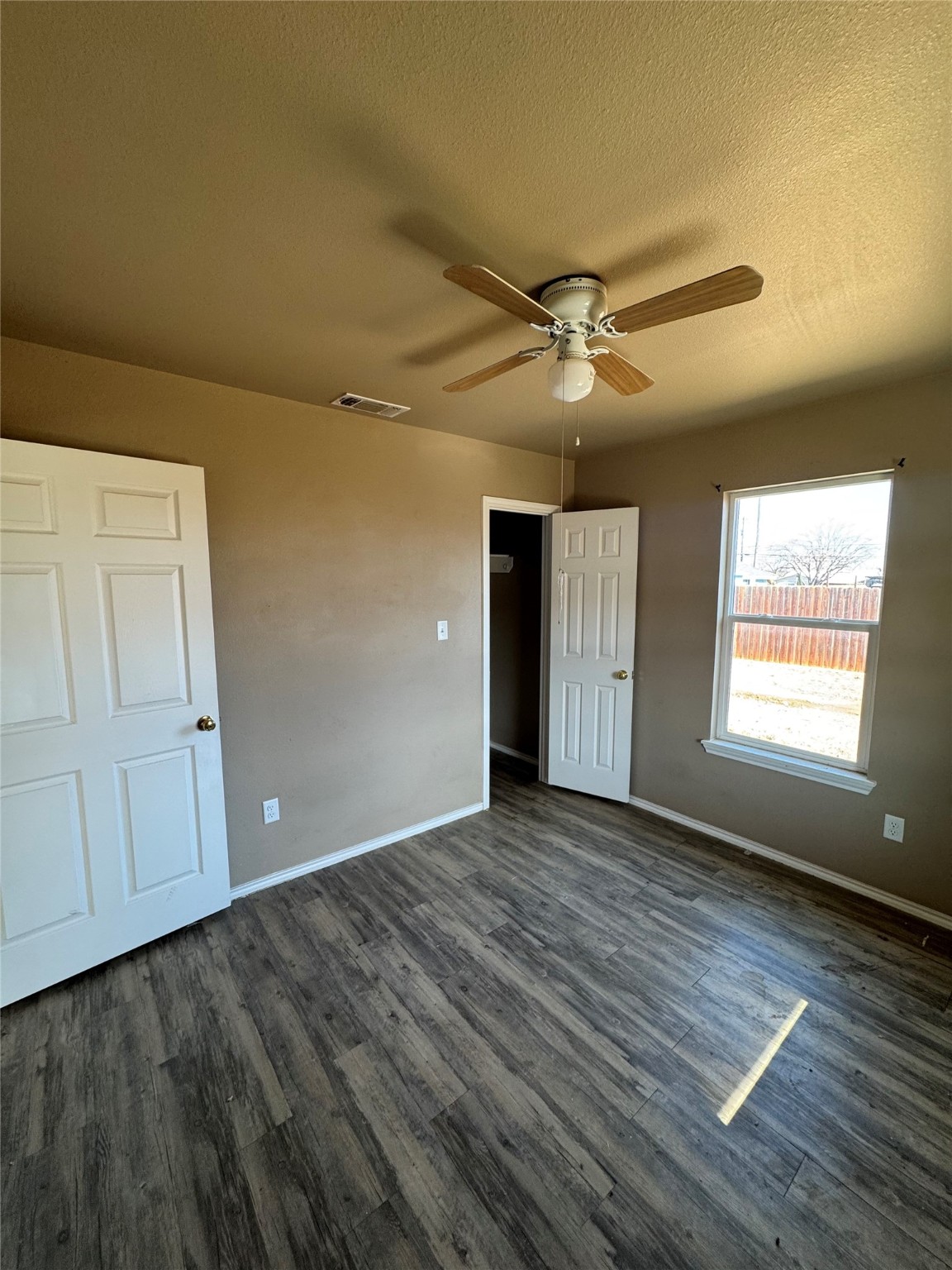 507 49th Street Lubbock, TX 79404 - Photo 22 of 50 a view of an empty room with a window