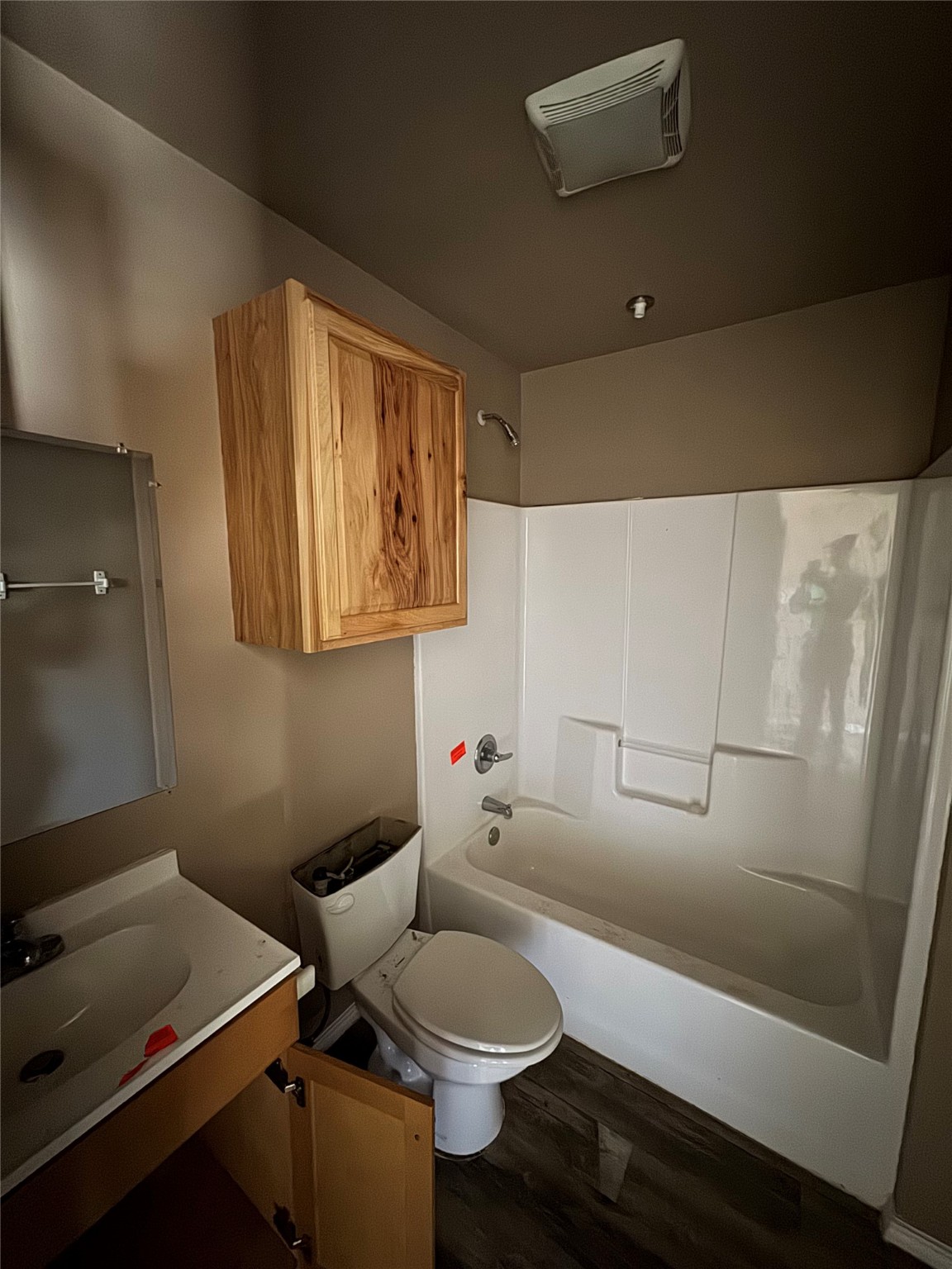 507 49th Street Lubbock, TX 79404 - Photo 26 of 50 a bathroom with a sink toilet and vanity