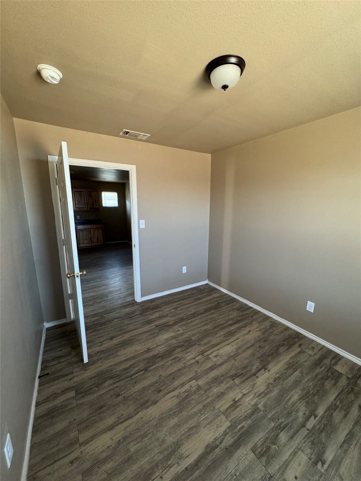 507 49th Street Lubbock, TX 79404 - Photo 30 of 50 a view of a room with wooden floor