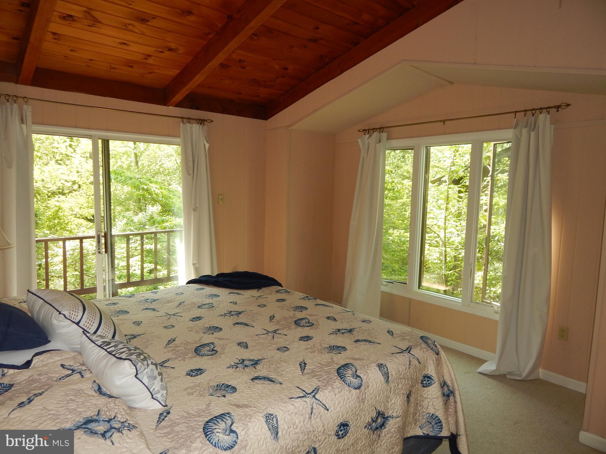 2773 Allspice Road Port Republic, MD 20676 - Photo 11 of 26 Bedroom (Master) with deck.