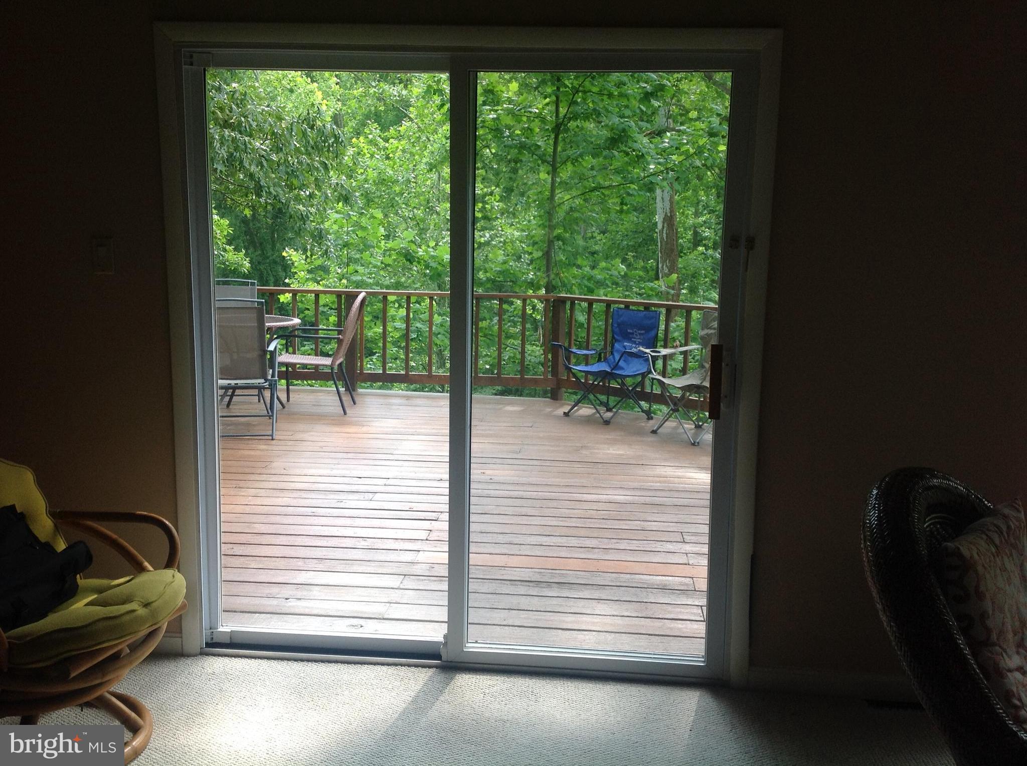 2773 Allspice Road Port Republic, MD 20676 - Photo 7 of 26 Living Room exit to the tree top porch!