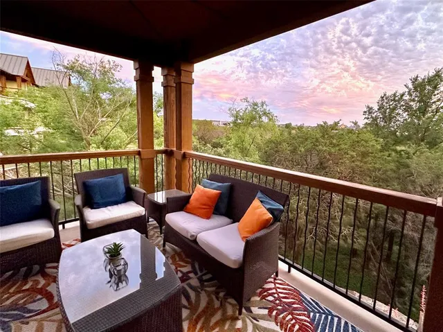 a view of a two chairs in the deck