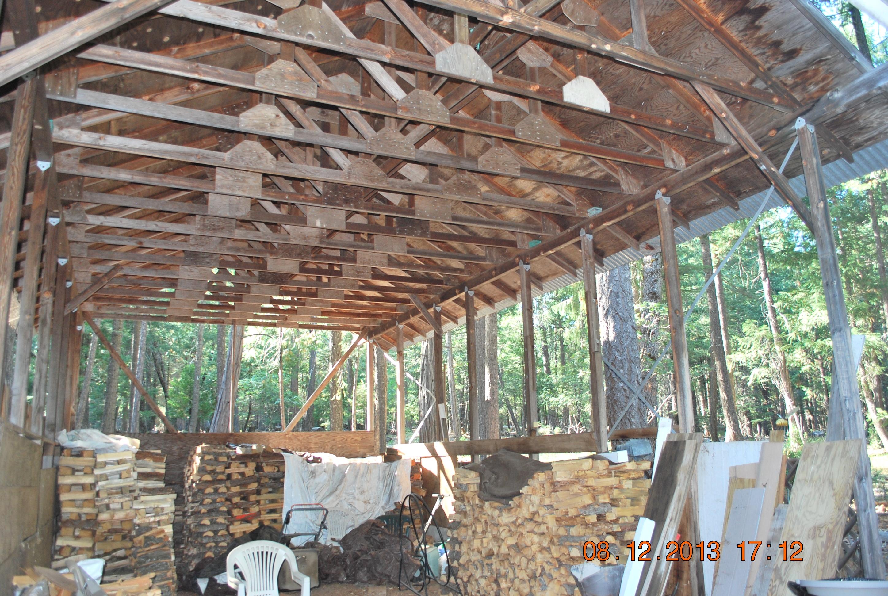 8282 McCumber Lk Road Shingletown, CA 96088 - Photo 23 of 36 Carport w fire wood