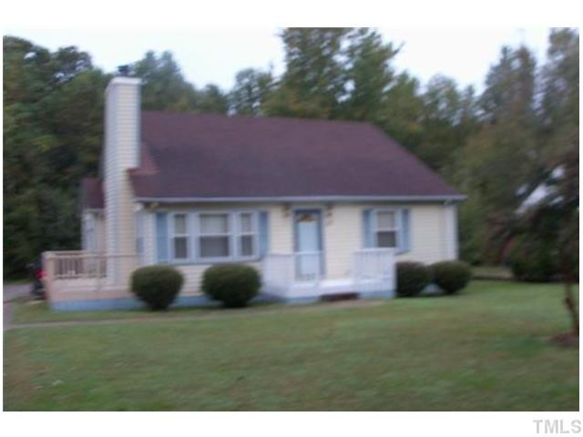 849 Cross Link Road Raleigh, NC 27610 - Photo 2 of 8 a front view of a house with a garden