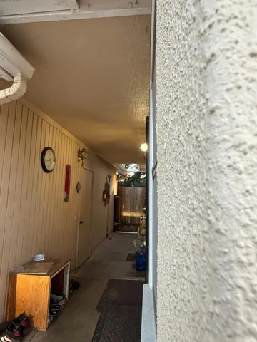 a view of a city street with cars