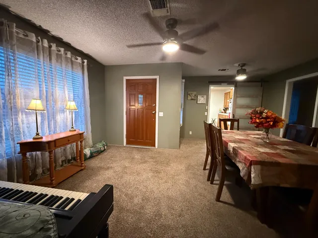 a view of a livingroom with furniture