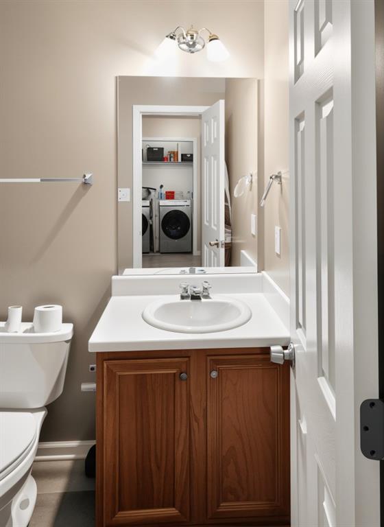 1737 Fielding Way Hampton, GA 30228 - Photo 15 of 17 a bathroom with a sink and a mirror