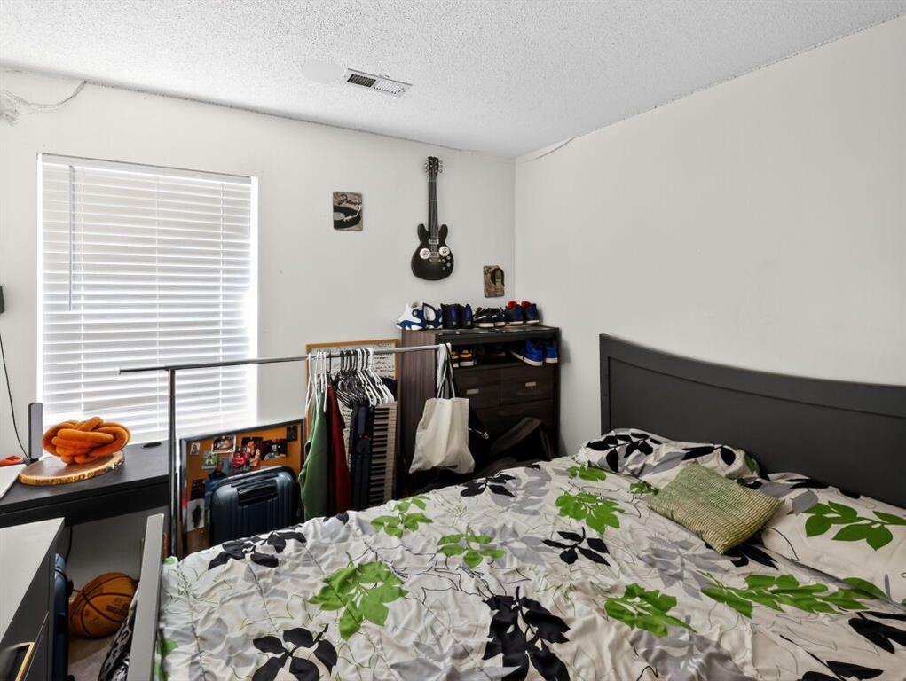 1737 Fielding Way Hampton, GA 30228 - Photo 10 of 17 a bed room with a bed and a window