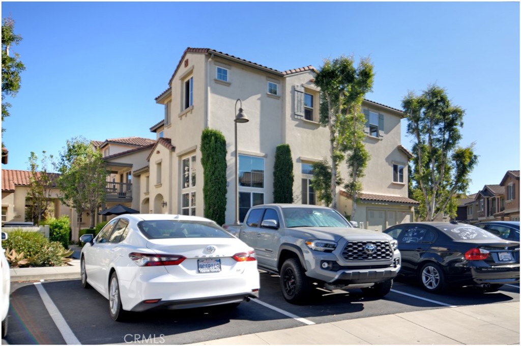 348 West Cork Tree Drive Orange, CA 92865 - Photo 1 of 1 a car parked in front of a house