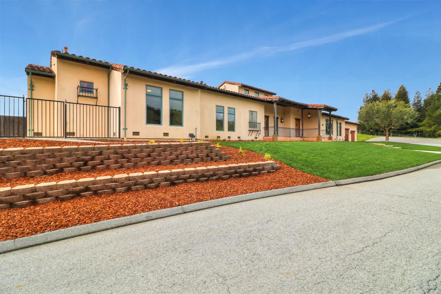 4280 Canada Road Gilroy, CA 95020 - Photo 16 of 50 a front view of a house with a yard
