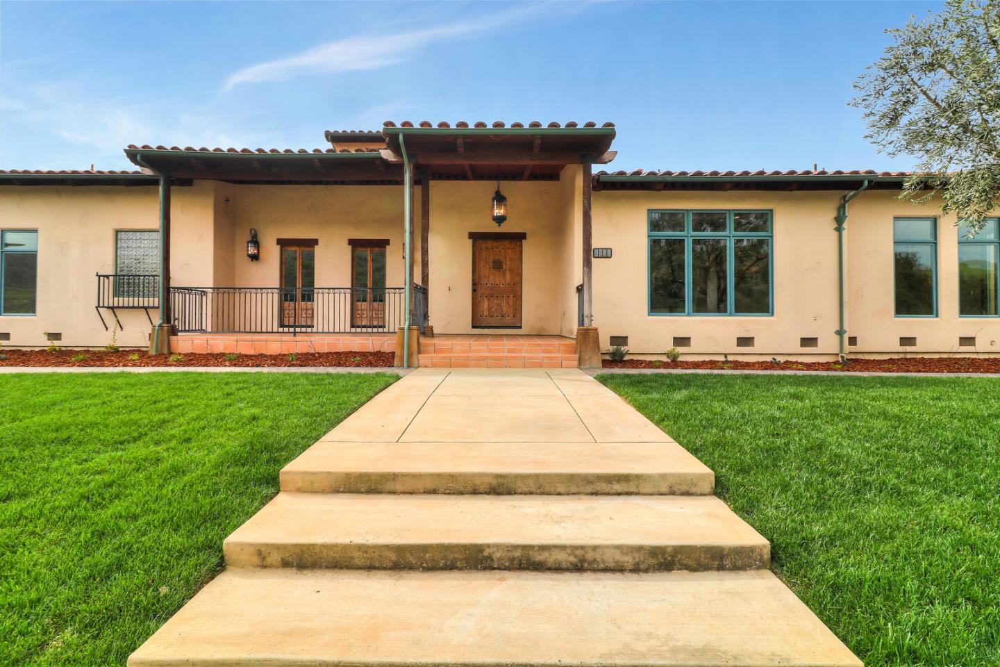 4280 Canada Road Gilroy, CA 95020 - Photo 19 of 50 a front view of a house with a yard