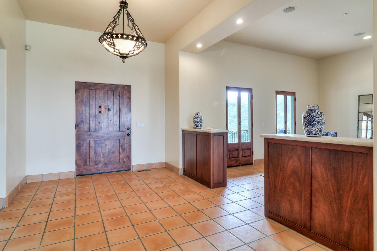 4280 Canada Road Gilroy, CA 95020 - Photo 23 of 50 a view of a hallway with a chandelier and closet