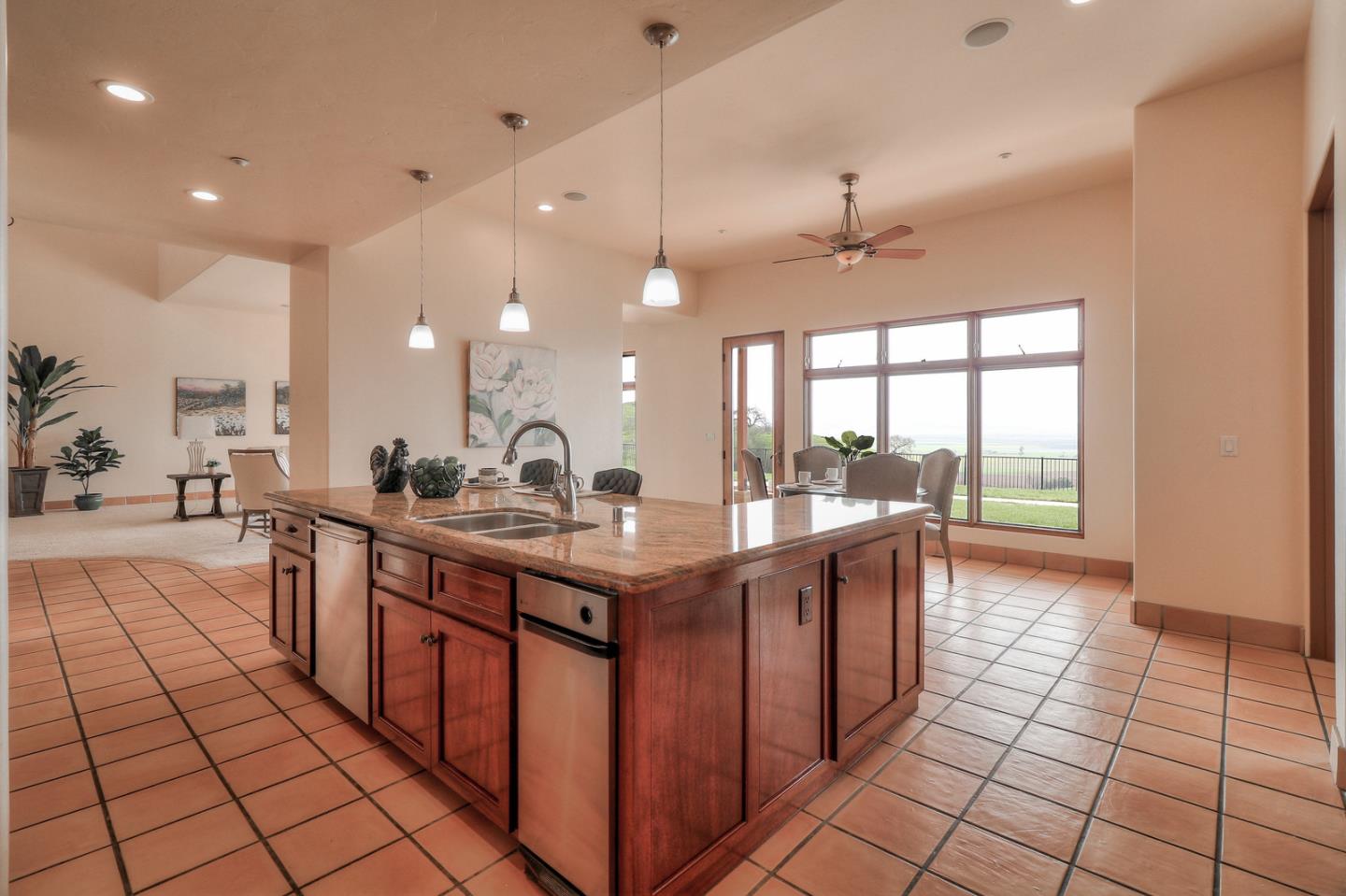 4280 Canada Road Gilroy, CA 95020 - Photo 38 of 50 a large kitchen with kitchen island granite countertop a large stove a sink and a oven