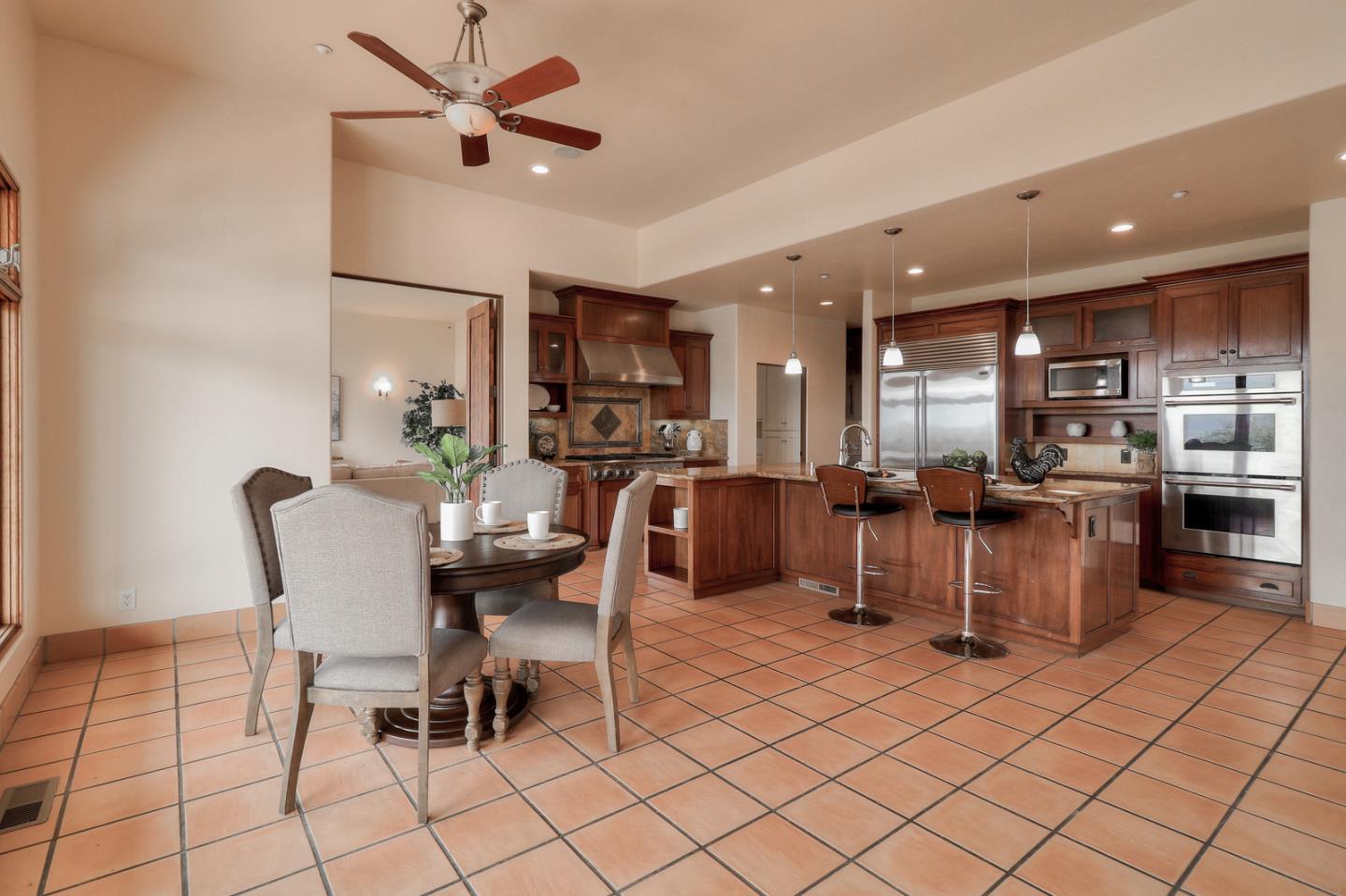4280 Canada Road Gilroy, CA 95020 - Photo 40 of 50 a dining room with furniture a window and kitchen