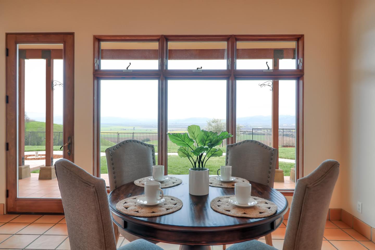 4280 Canada Road Gilroy, CA 95020 - Photo 41 of 50 a dining room with furniture window and wooden floor