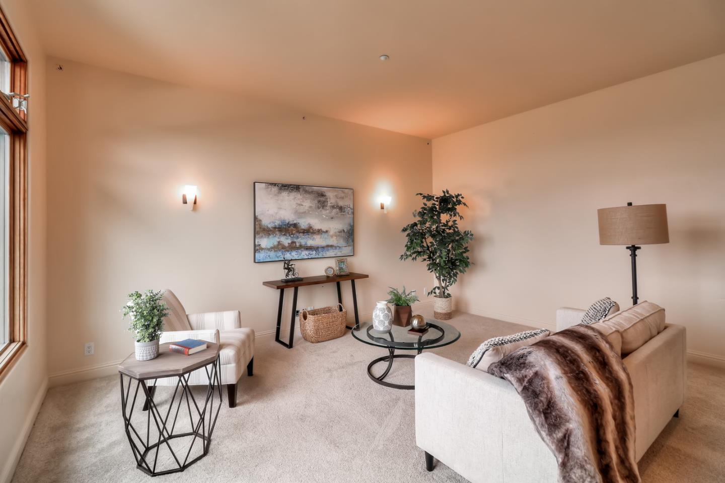 4280 Canada Road Gilroy, CA 95020 - Photo 45 of 50 a living room with furniture a chandelier and a potted plant