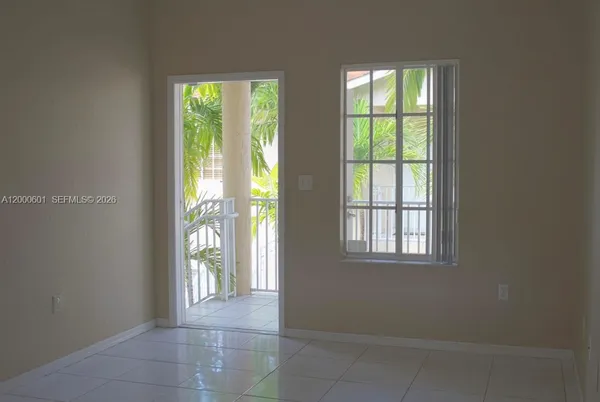 an empty room with windows