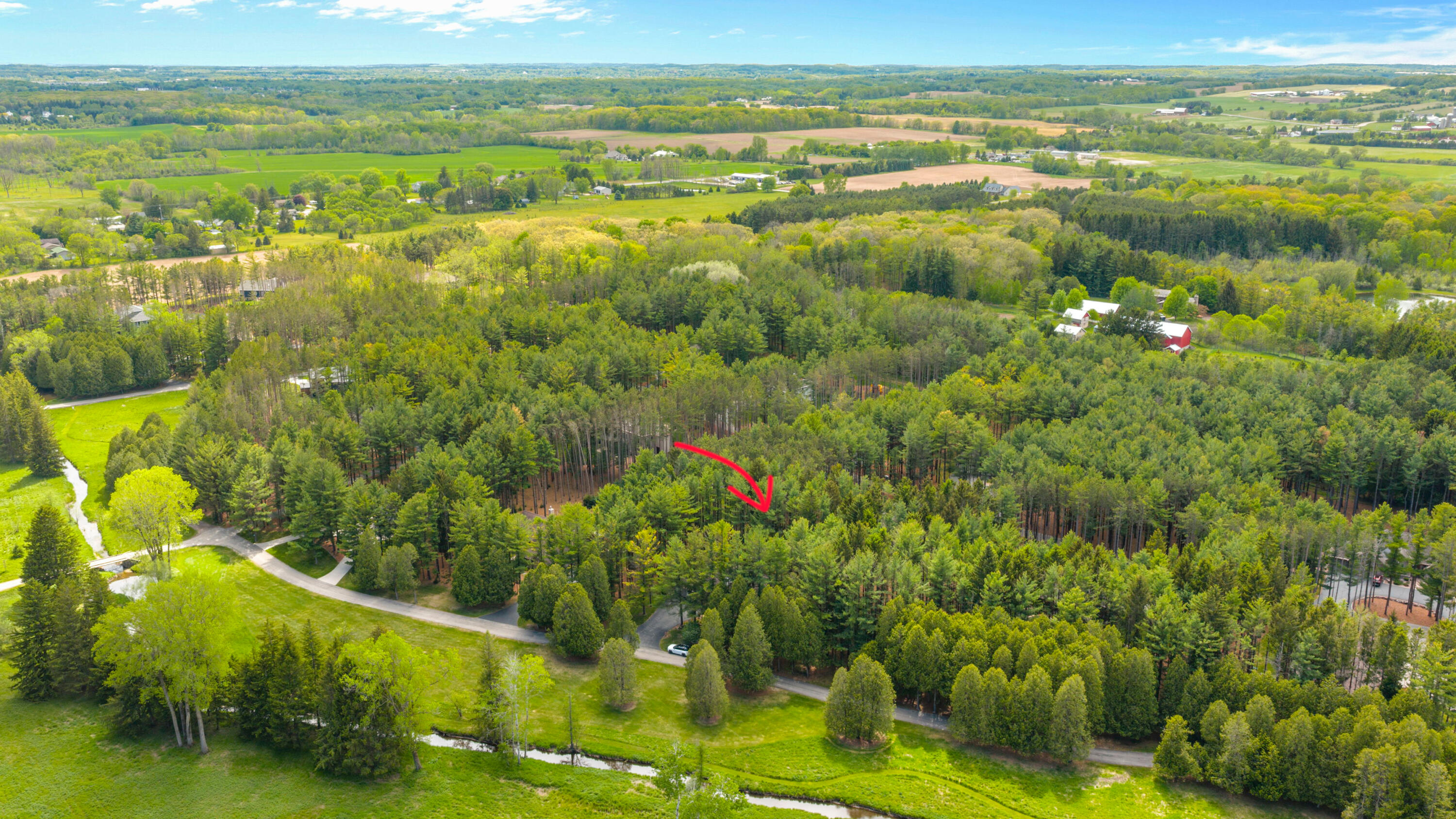 7855 Indian Lore Road, Unit 20 Farmington, WI 53090 - Photo 35 of 38 Drone w_ arrow3