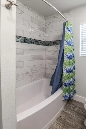 a bathroom with a bathtub