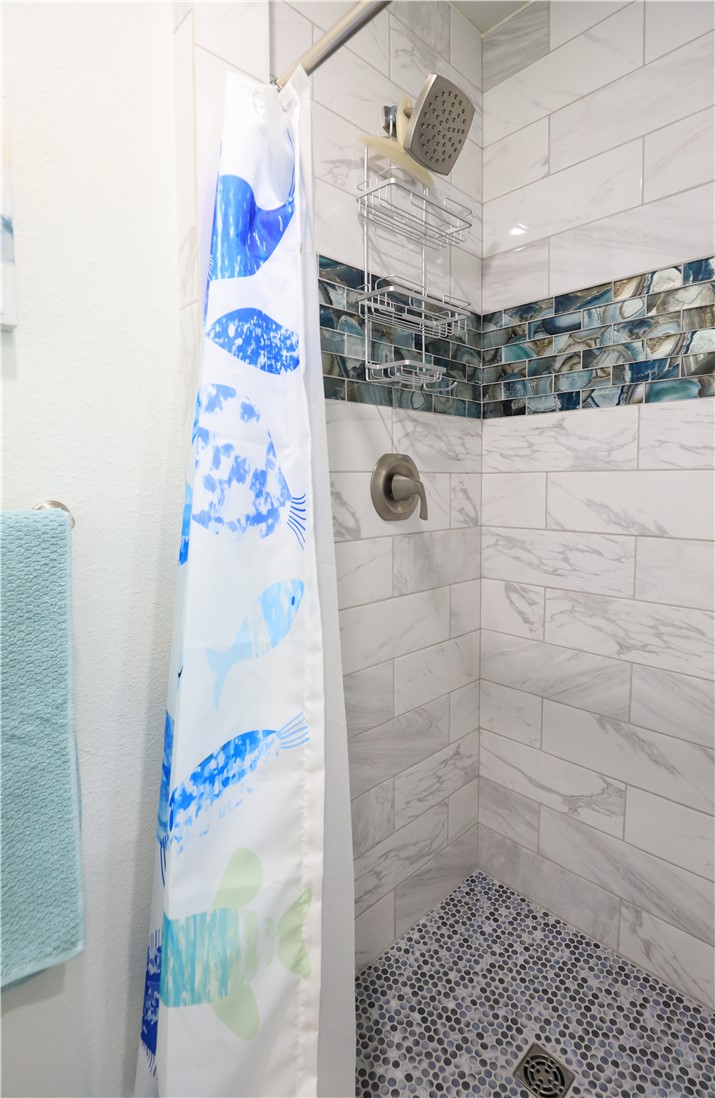 125 Lakewood Drive Mathis, TX 78368 - Photo 24 of 39 a bathroom with a shower