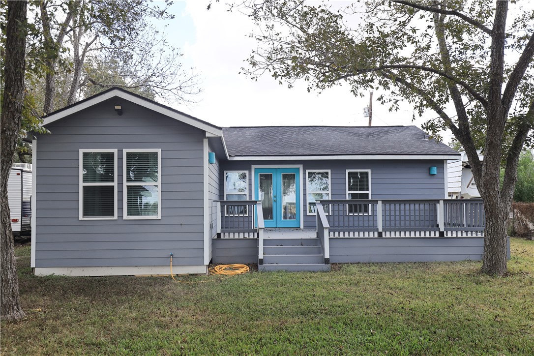 125 Lakewood Drive Mathis, TX 78368 - Photo 29 of 39 a house view with a garden space