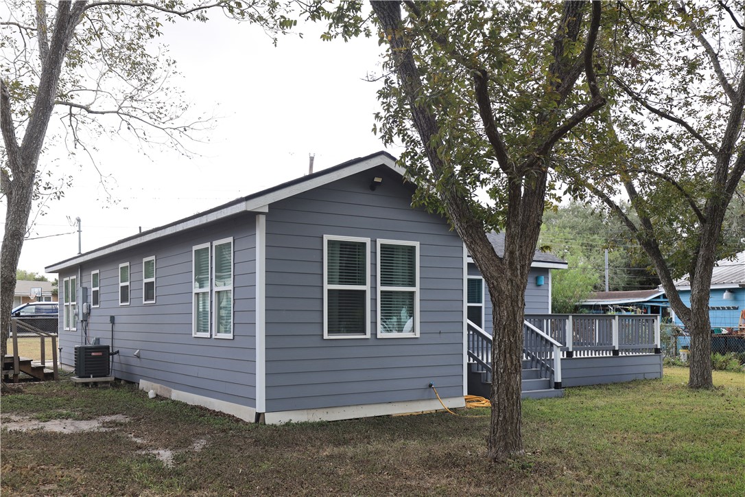 125 Lakewood Drive Mathis, TX 78368 - Photo 30 of 39 a view of a house with a yard