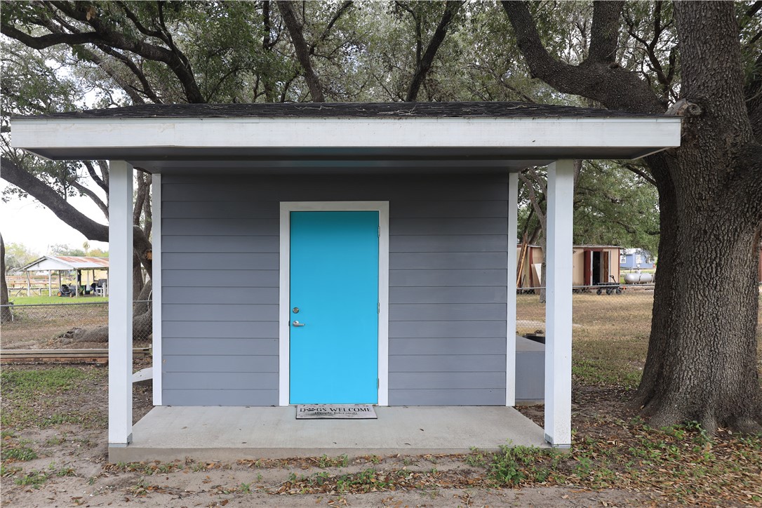125 Lakewood Drive Mathis, TX 78368 - Photo 32 of 39 a view of a wooden door