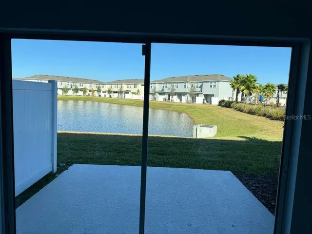 a view of swimming pool from a yard