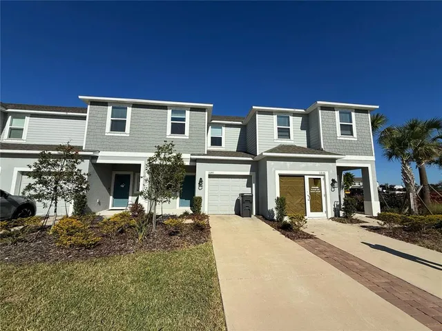 a view of a house with many windows