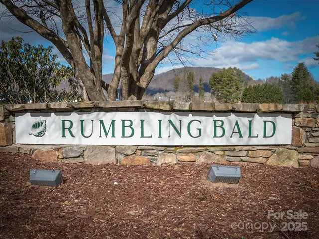 an aerial view of residential house with outdoor space and river