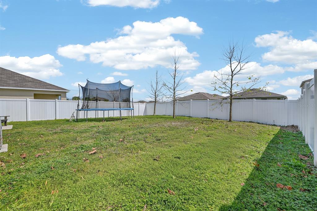 1809 Myrtlebrooke Drive Edgewater, FL 32141 - Photo 36 of 58 a view of a backyard