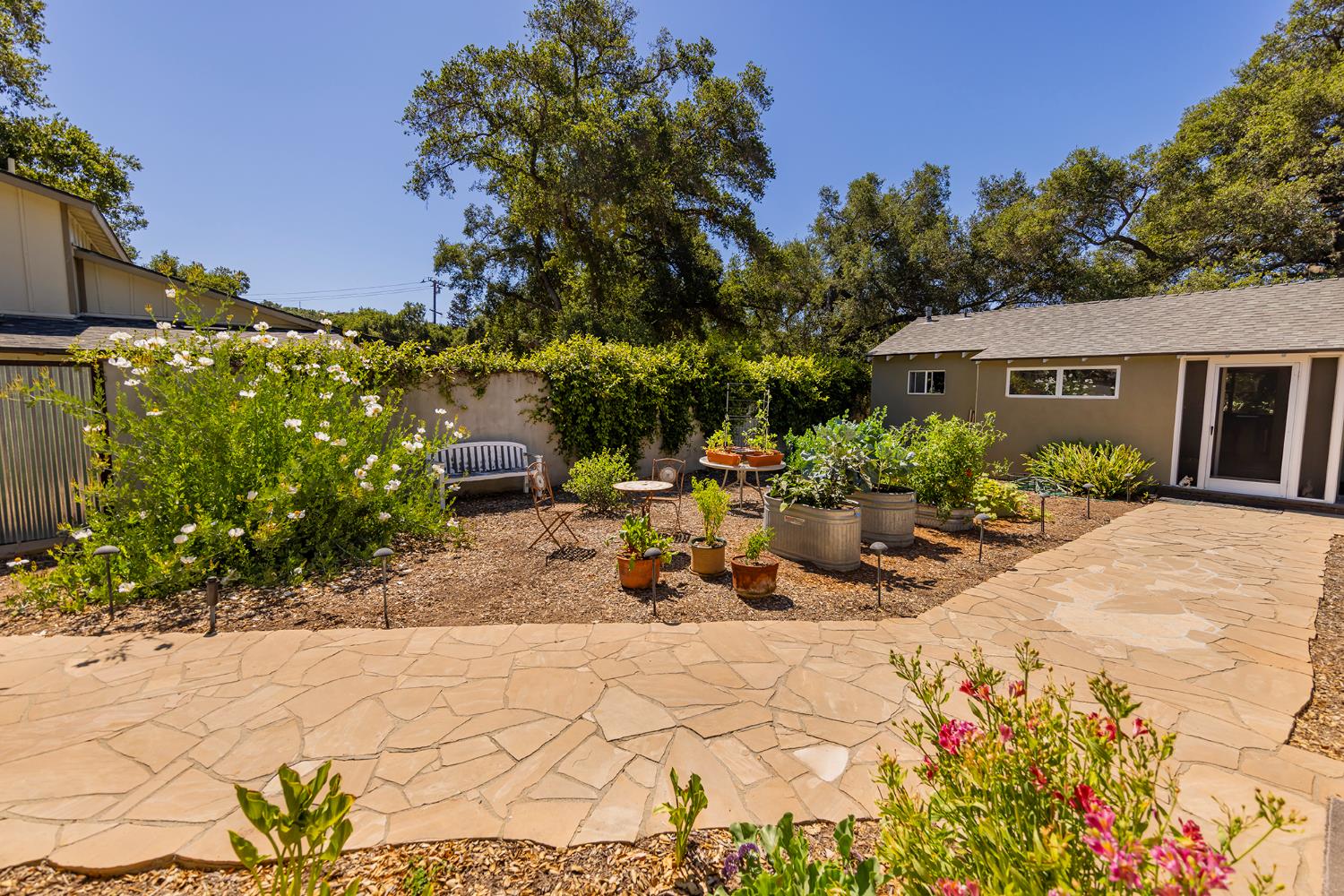 840 Fairview Road Ojai, CA 93023 - Photo 12 of 30 front view of a house with a bench