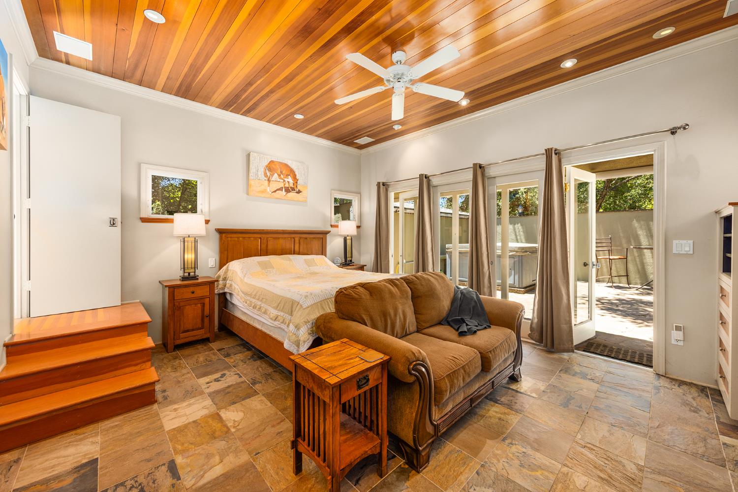 840 Fairview Road Ojai, CA 93023 - Photo 20 of 30 a spacious bedroom with a bed and glass door