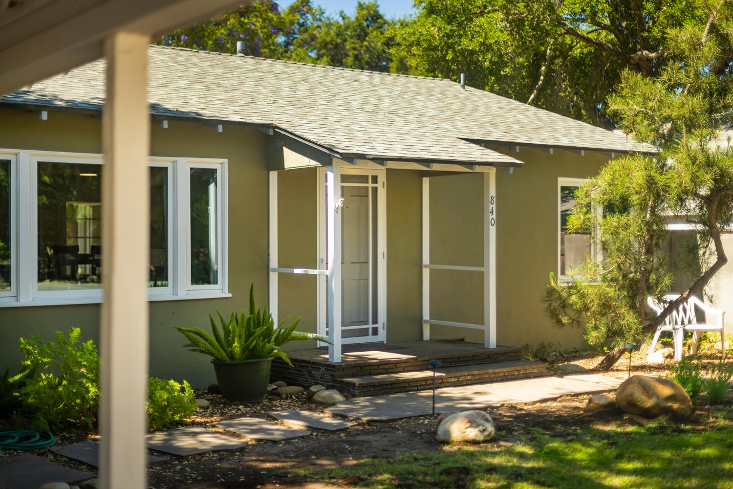 840 Fairview Road Ojai, CA 93023 - Photo 2 of 30 a view of a house with small yard plants and large tree