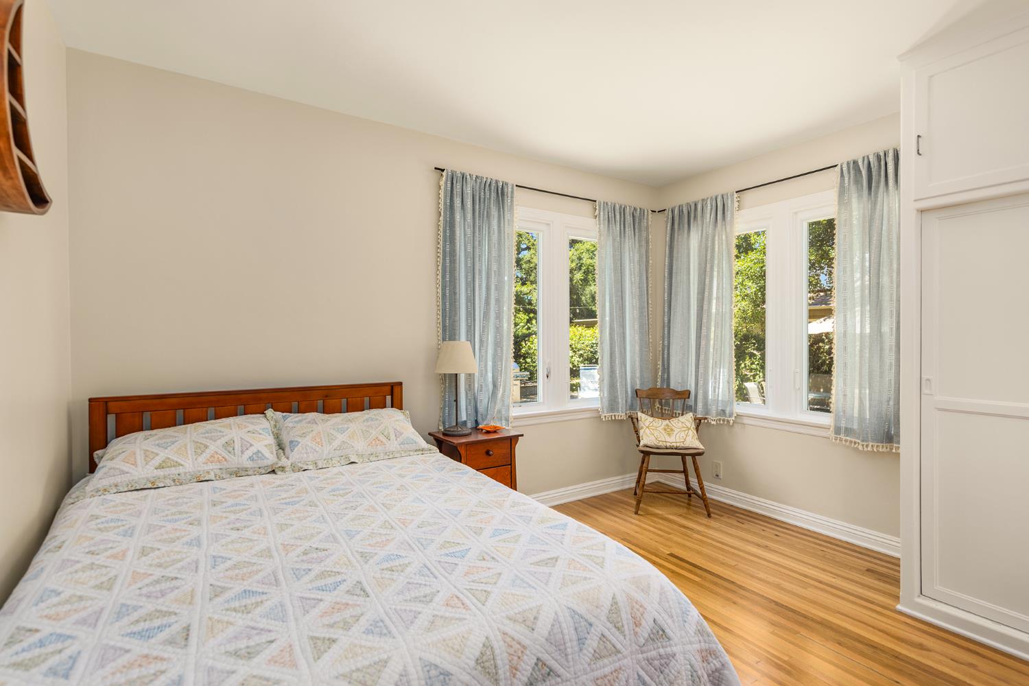 840 Fairview Road Ojai, CA 93023 - Photo 7 of 30 a bedroom with a large bed and a large window