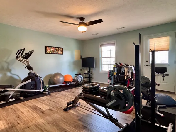 a view of a room with gym equipment