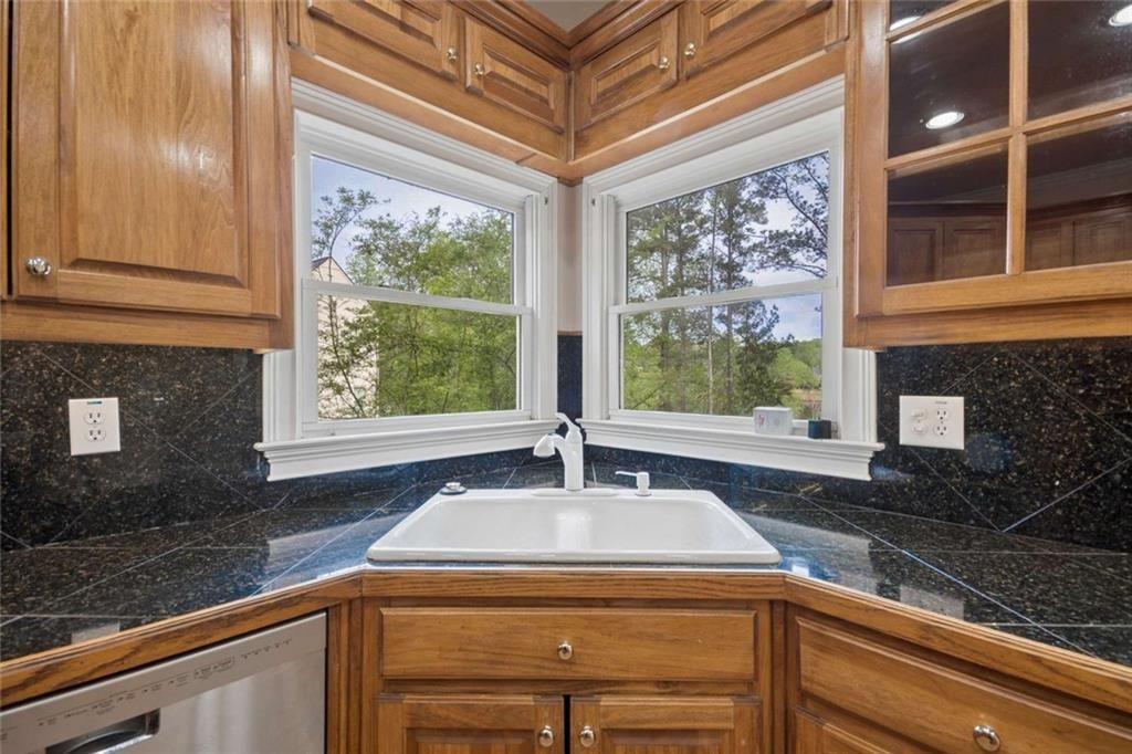 2628 High Street Southwest Conyers, GA 30094 - Photo 19 of 53 a kitchen with a sink and a large window