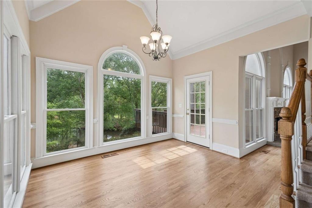 2628 High Street Southwest Conyers, GA 30094 - Photo 20 of 53 a view of a room with natural light wooden floor and windows