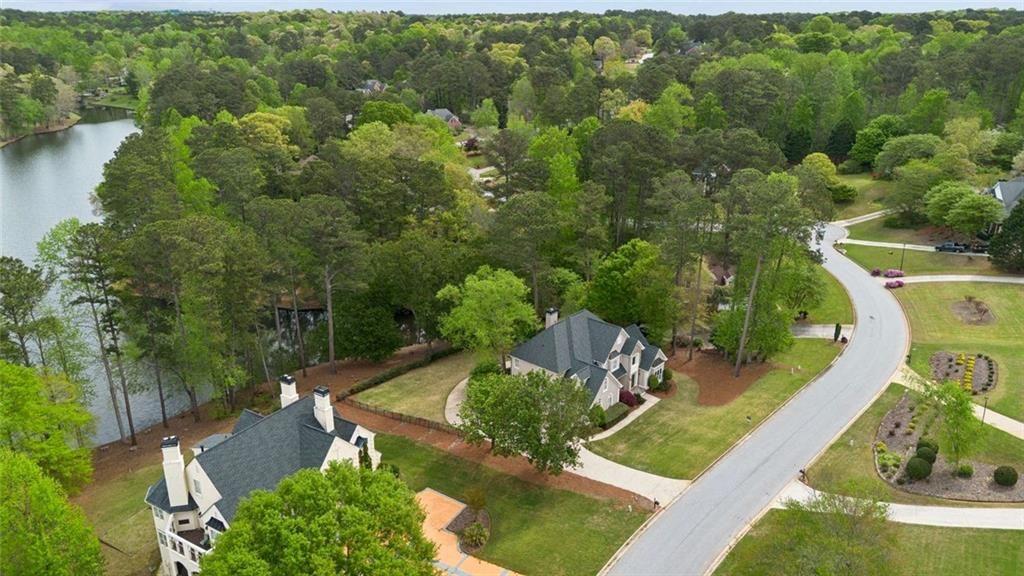2628 High Street Southwest Conyers, GA 30094 - Photo 2 of 53 an aerial view of a house with outdoor space swimming pool and mountains