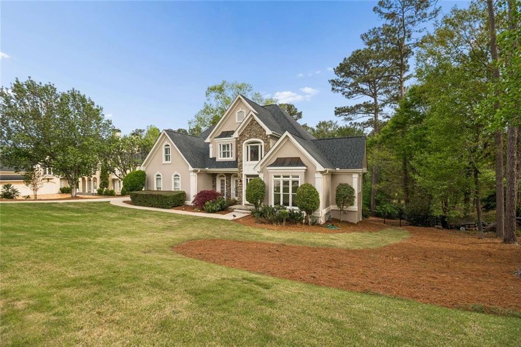 2628 High Street Southwest Conyers, GA 30094 - Photo 3 of 53 a front view of a house with a yard