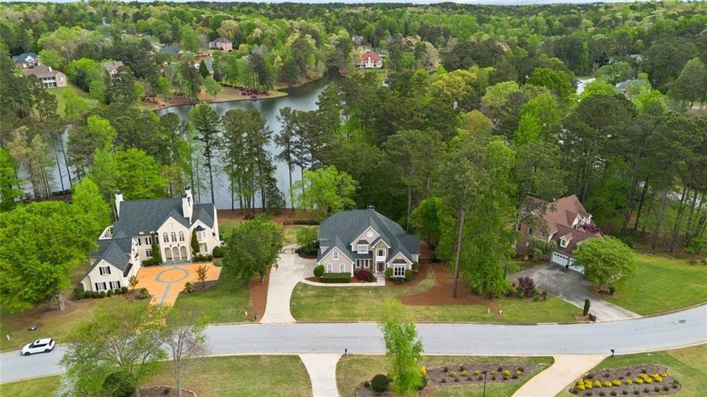 2628 High Street Southwest Conyers, GA 30094 - Photo 48 of 53 an aerial view of a house with swimming pool outdoor seating and yard
