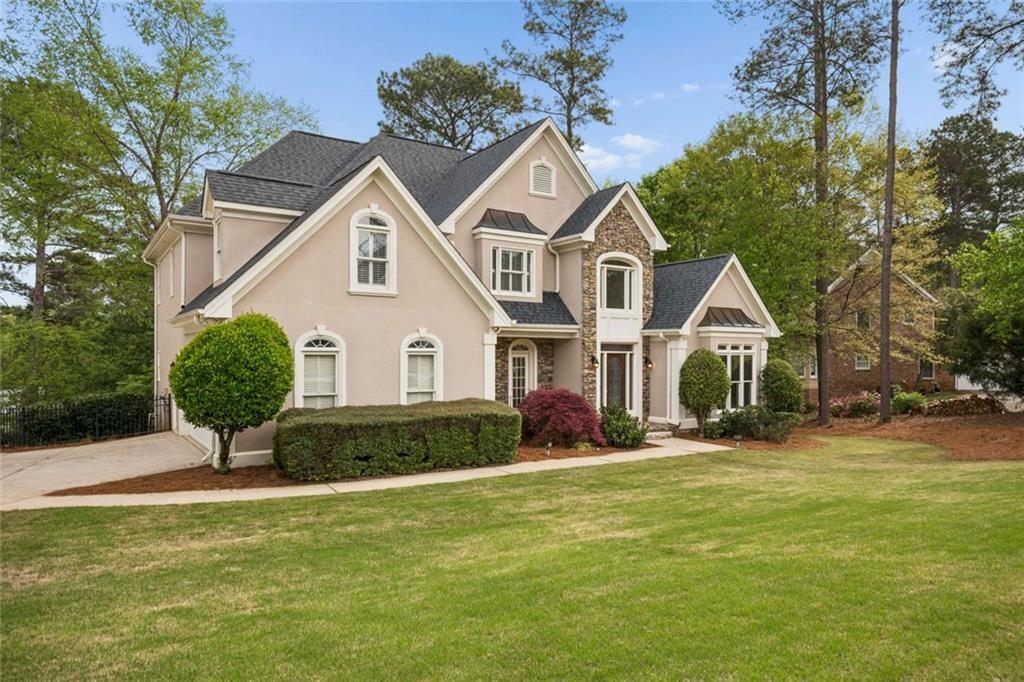 2628 High Street Southwest Conyers, GA 30094 - Photo 5 of 53 a front view of a house with a yard