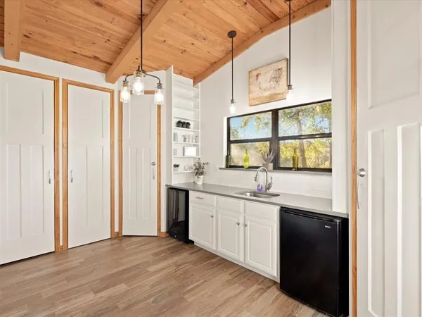 a view of a sink and a window