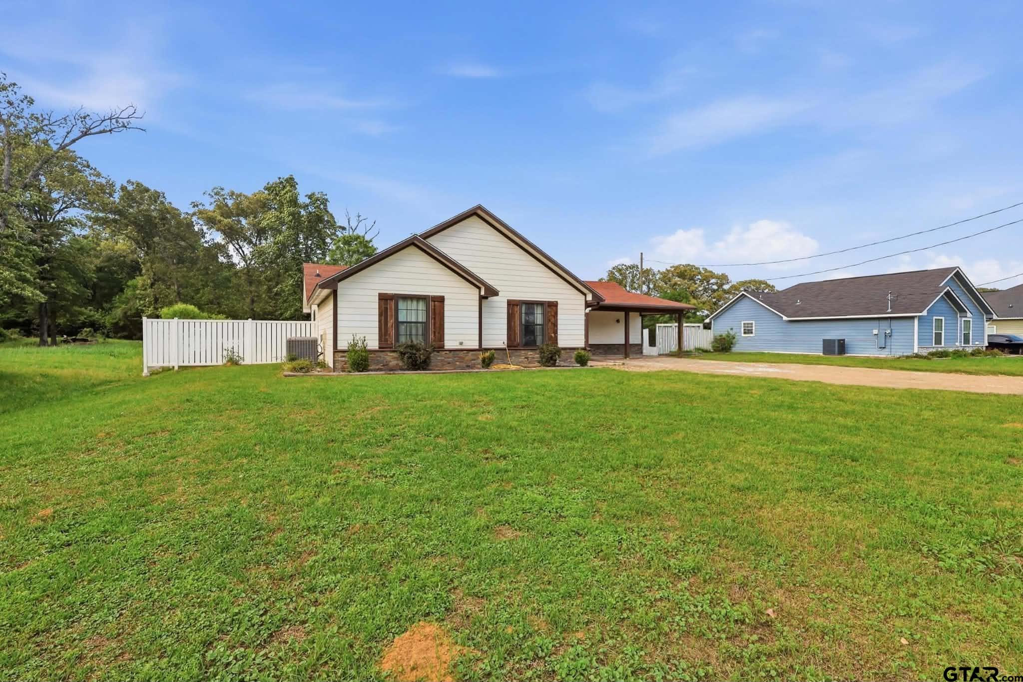 1933 Highway 11 Pittsburg, TX 75686 - Photo 23 of 34 a house view with a garden space