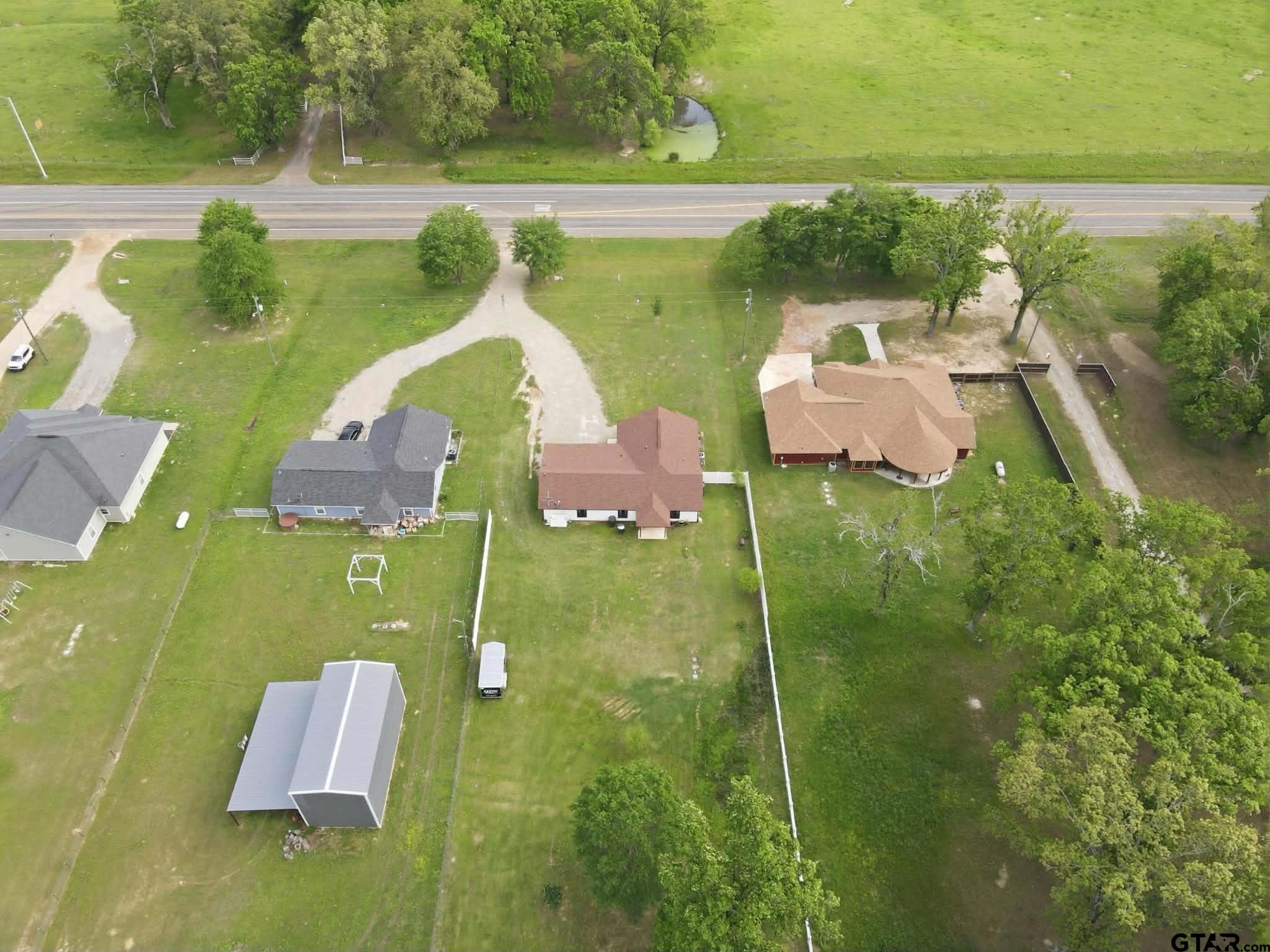 1933 Highway 11 Pittsburg, TX 75686 - Photo 27 of 34 an aerial view of a house having swimming pool